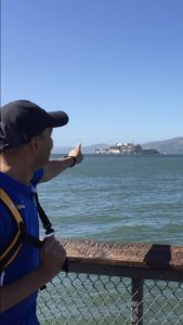 Giovanni pointing to Alcatraz